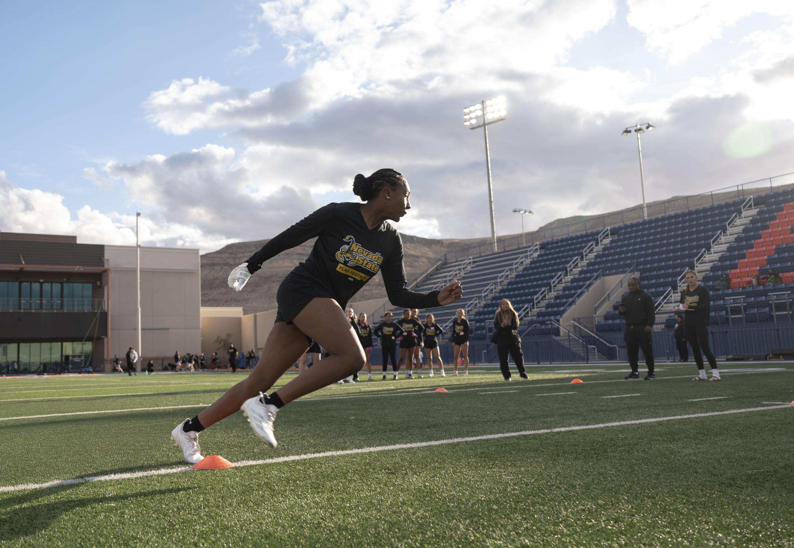 Student athlete in training at Nevada State's track facility, demonstrating dedication to both athletic and academic excellence